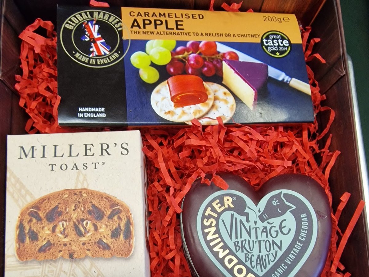A gift hamper of crackers, cheese and chutney